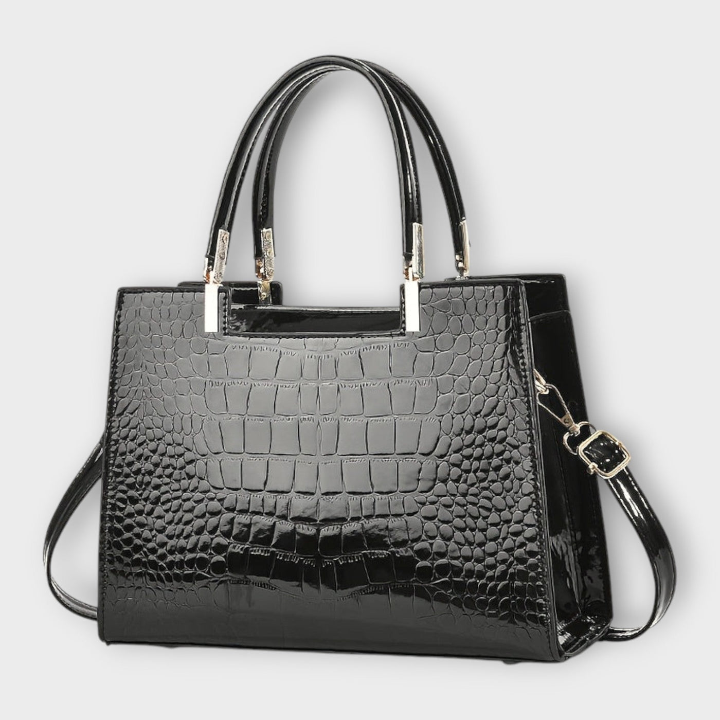 Bolso de mano con estampado de cocodrilo brillante