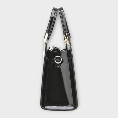 Bolso de mano con estampado de cocodrilo brillante